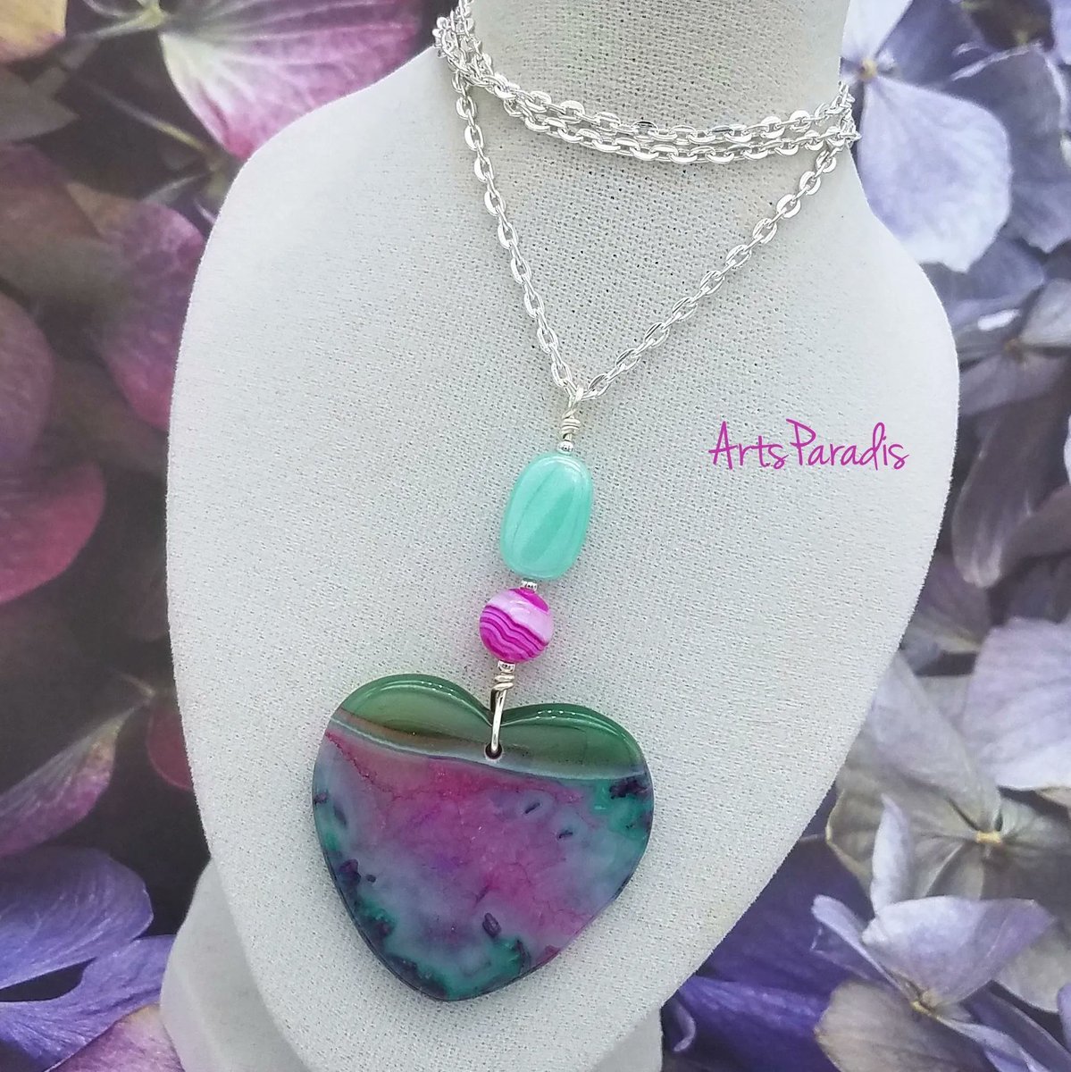 This stone is amazing! It's ruby zoisite. I wanted to draw out the magenta and mint colors when I made this necklace. Not a color combo you see very often, so they definitely work together here.