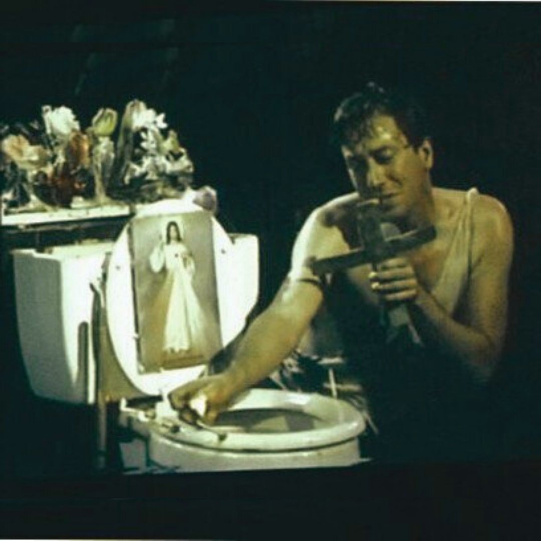 OdysseyTheatre_'s tweet photo. John Fleck (It's alive, it's ALIVE!) is one of the NEA Four — a group of performance artists who in 1990 had their NEA grants rescinded. They won their Supreme Court Case.
Pictured is Fleck’s work “Blessed are the Little Fishes” that sparked the controversy.
#NEA4 #NEAfour https://t.co/pR9dQH5lIJ