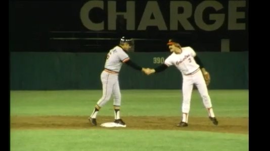 Bobby Grich congratulates Al Kaline on his 3,000th hit, a double hit to right field.