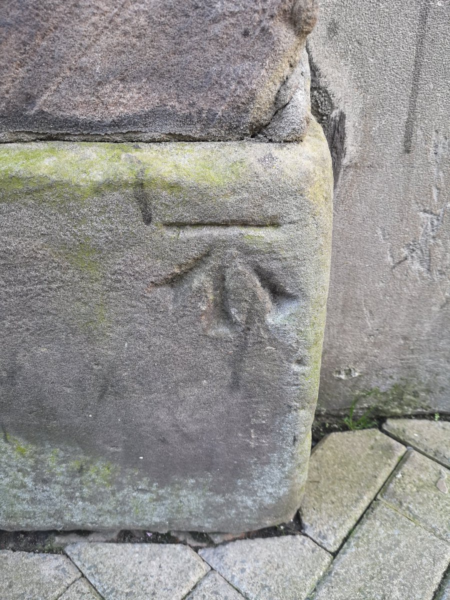 An actual benchmark. Located on. Crypt Chambers.
Have a good day.