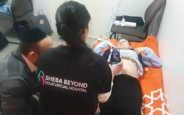 daniel_kraft's tweet photo. Doctors in Israel care for Ukrainians 2,000 km away…

As part of a new “virtual hospital”  physicians examine refugees on the Ukraine-Moldova border, check lungs, blood stats &amp; even conduct prenatal ultrasounds.

#DigitalHealth #telemedicine #Ukraine️

https://t.co/uACuwWPMPr https://t.co/McsklriLqb