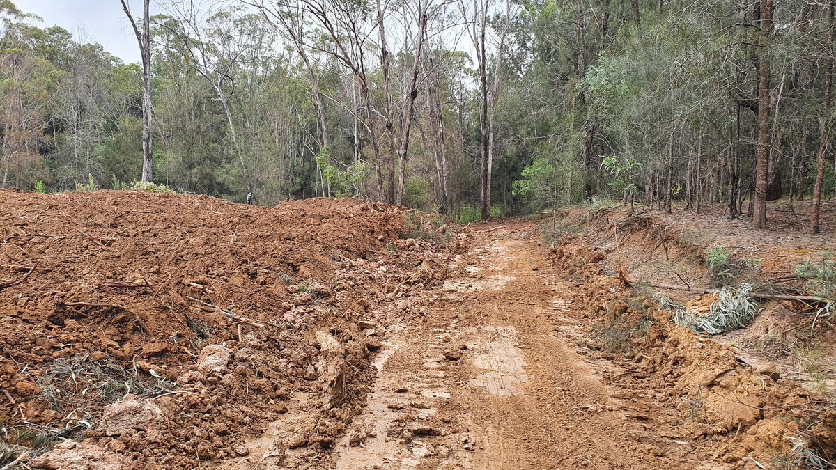 MorpheusBeing's tweet photo. #DamRepairs more done today until rain showers made the clay too slippery. Dozer using about 3.5l/hour of diesel. I'm buggered from using the steering clutches and brakes. Widening to 3 blades width and deepening the spillway/overflow by about 500mm. Tomorrow get the level out. https://t.co/kkdf605nye