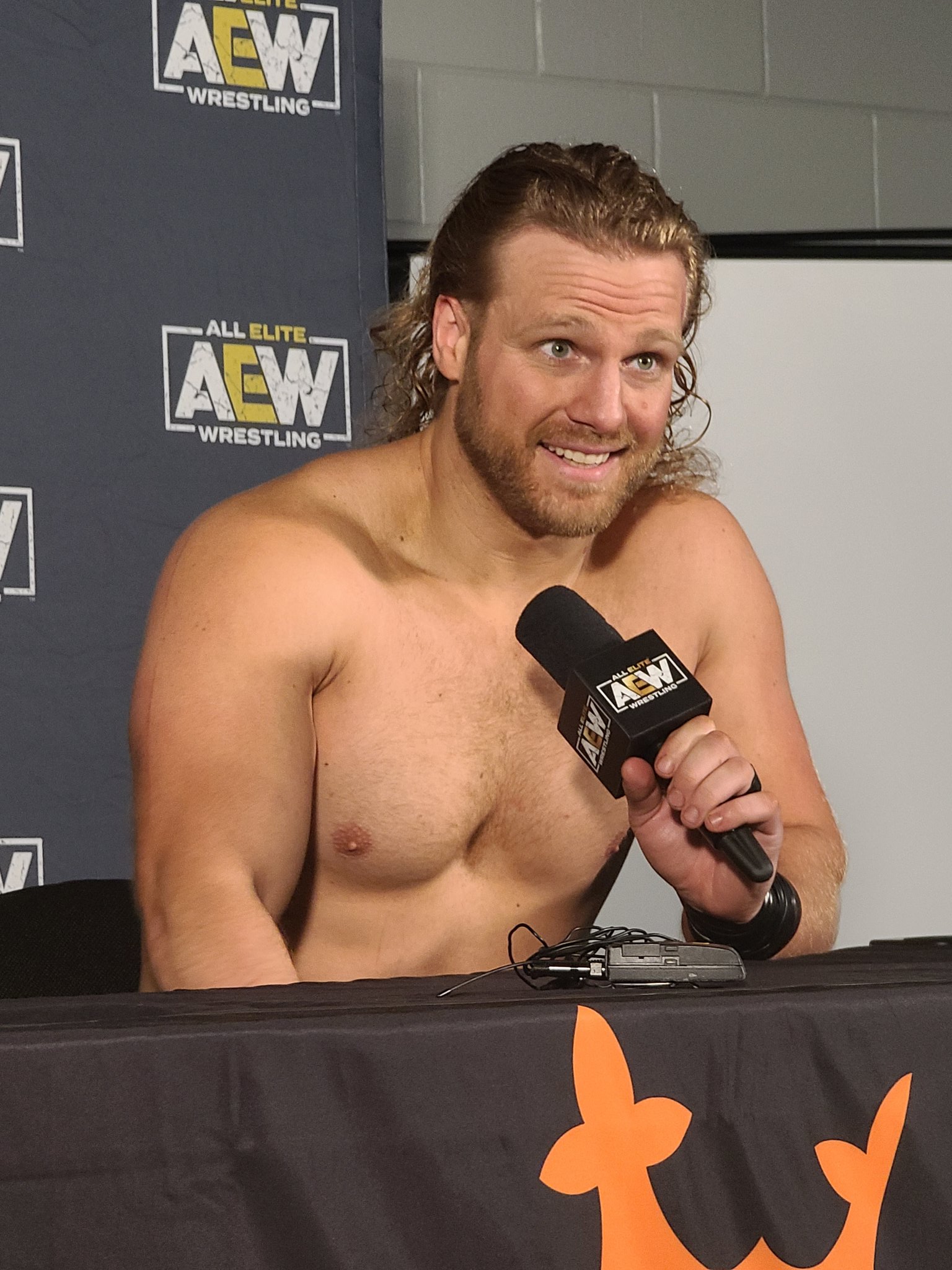 Denise 'Hollywood' Salcedo on X: Hangman Adam Page has now joined the AEW  Revolution media scrum.  / X