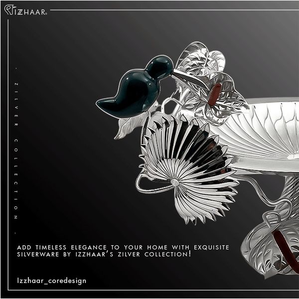 _Izzhaar's tweet image. The essence of relentless glitz and timelessness! 
Delighted to announce 𝗧𝗵𝗲 𝗛𝘂𝗺𝗺𝗶𝗻𝗴𝗯𝗶𝗿𝗱 𝗕𝗼𝘄𝗹 an addition that will amplify the beauty of your house by a hundredfold. Keep it on the centre table and fill it with fruits, berries, or dry fruits.
#izzhaar #silver