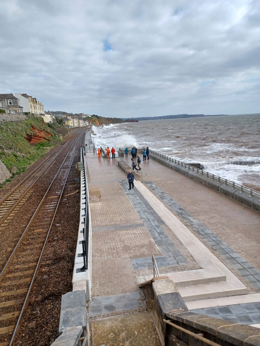 SouthWestRRP's tweet photo. 👍 Coastguard's footbridge in Dawlish has reopened to the public. 

🚶Walkers can now cross the bridge to reach Dawlish Warren along the sea wall. 

🦺 The section of sea wall between Coastguards and Colonnade breakwaters remains closed while we continue our work there. https://t.co/uDypj87ZFp