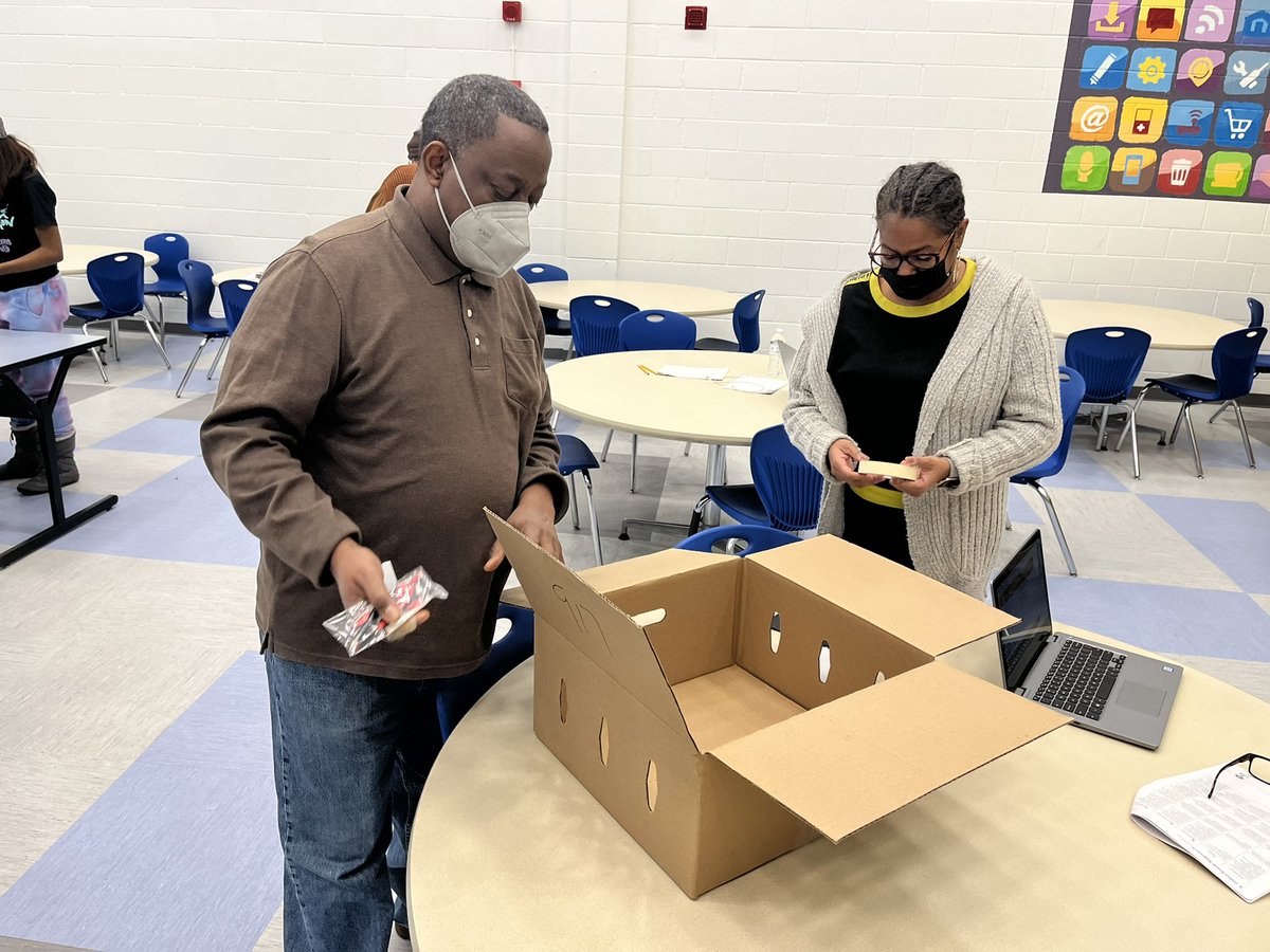 EarleStem's tweet photo. #EarleSTEM Staff completing an #EngineeringDesignChallenge #EDC Can you work as a #mechanical #engineer? Let’s build a projector and have fun doing it!! @CPSNetwork11 @cpsSTEM https://t.co/AaUuInPDe3
