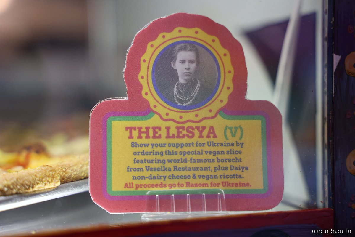evgrieve's tweet photo. For years, @TwoBootsHQ has named their special pies (see The Dude). They just unveiled 2 new pizzas: the Mr. Ze, for Ukraine President Volodymyr Zelenskyy, and the Lesya, for the Ukrainian writer-activist Lesya Ukrainka. All proceeds from sales go to @razomforukraine. https://t.co/djHdg1mEUp