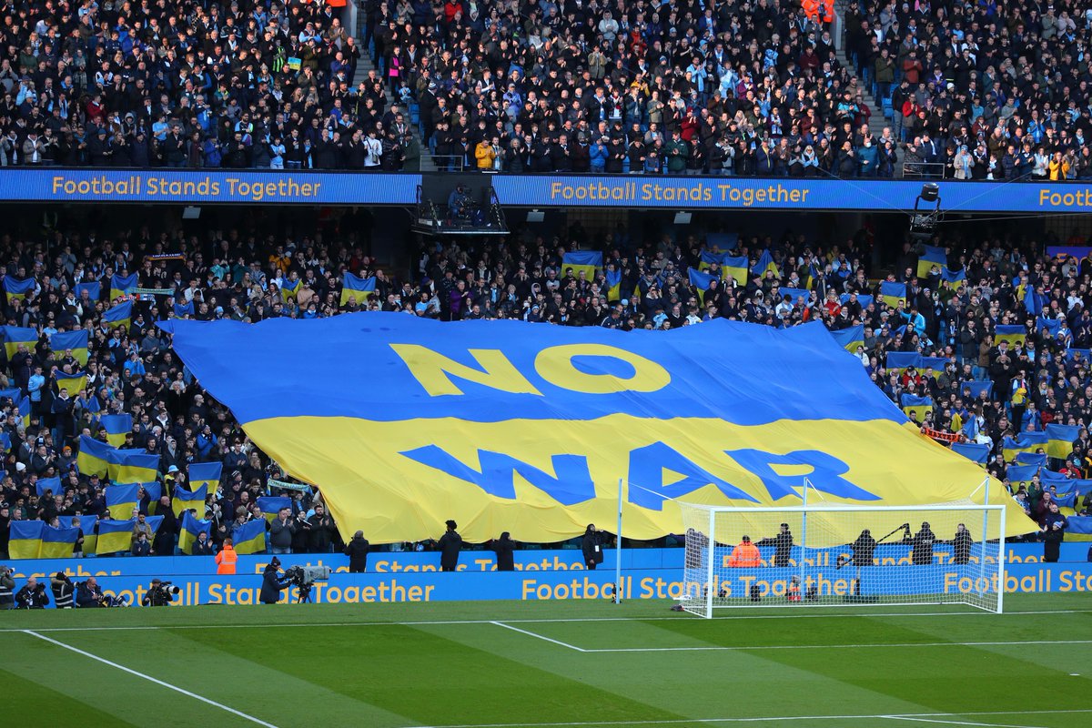 UKinVietnam's tweet photo. Last weekend, all 20 @premierleague teams, players and fans all over the country showed grand displays of solidarity &amp; support for 🇺🇦 &amp; opposition to the war. Stadiums across the country were filled with blue and yellow 🇺🇦.
#StandwithUkraine #FootballStandsTogether https://t.co/nGnS3eW305