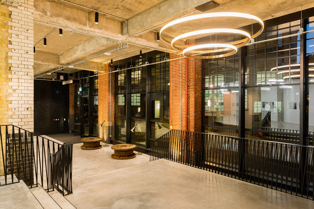 Former print works converted by <a href="/bgyarchitects/">Buckley Gray Yeoman</a> shows how a warehouse space like this can work well for a mixed-use development, currently home to lots of businesses as well as residential across the top floors and making a feature of it's industrial charm.