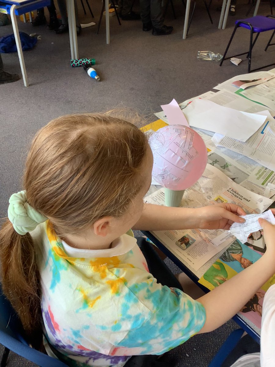 Year5tcps's tweet image. It was 5A’s turn to get messy today! Paper mache globes in progress! #geographyed