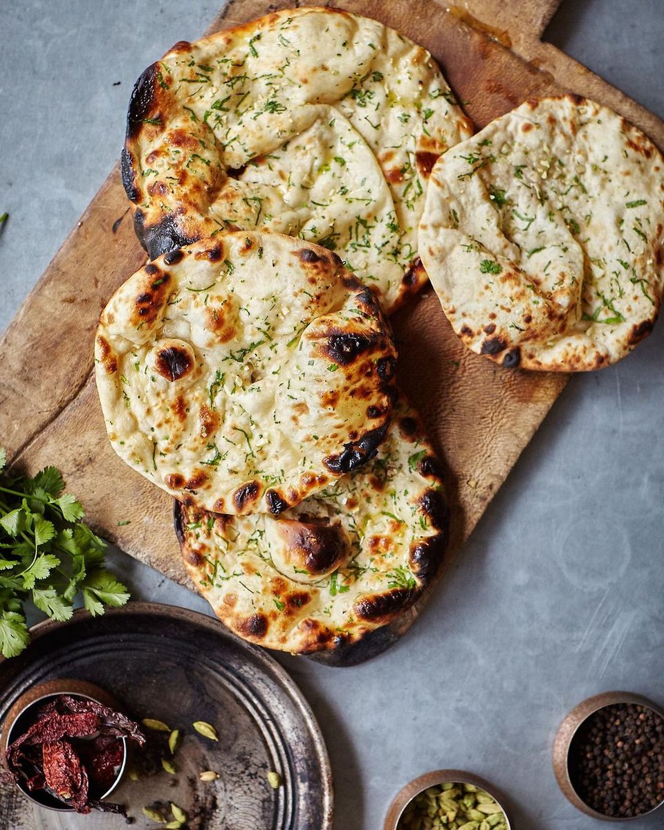 Naans brushed with melted butter, chopped coriander and garlic. There’s not much that beats it 😂 ❤️