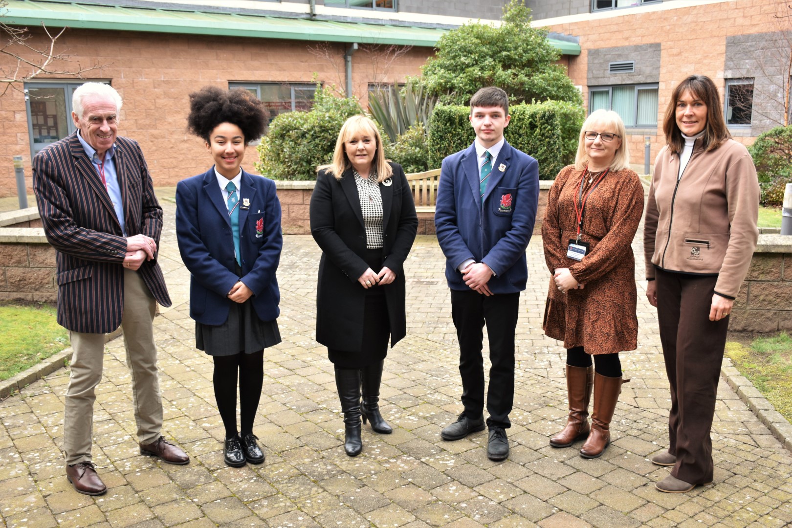wellington-college-belfast-on-x-we-were-delighted-to-welcome-michelle-mcilveen-minister-of-education-to-wellington-college-today-the-minister-was-greeted-by-ryan-and-faith-head-boy-head-girl