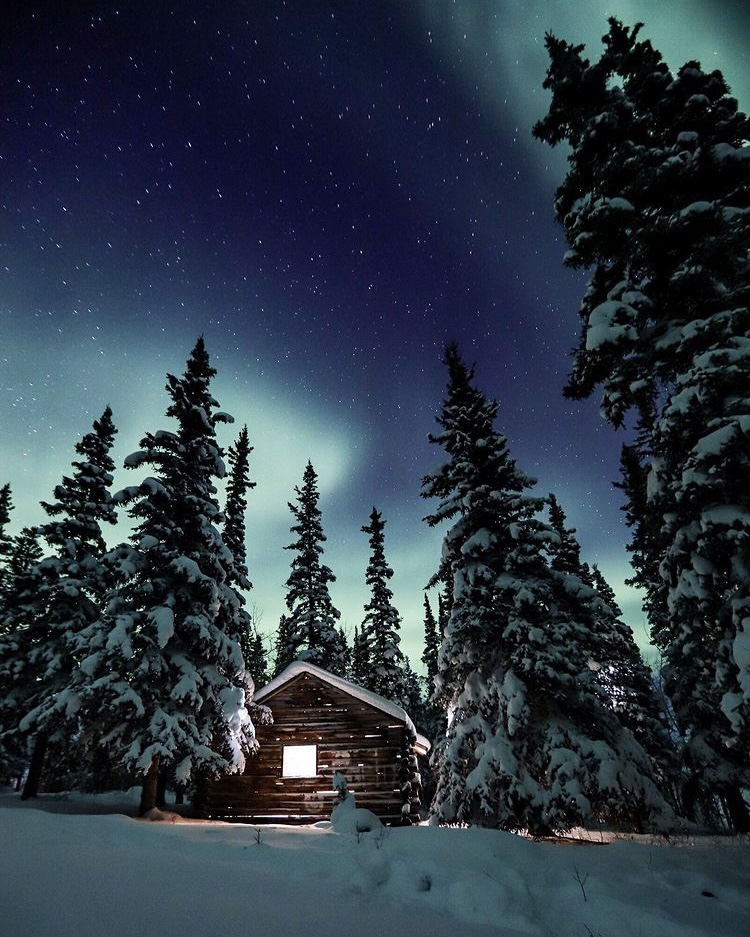 PracticeNWT's tweet photo. On a calm winter’s night, surrounded by a blanket of snow and the vast boreal forest, it’s easy to get lost in the aurora borealis that dances overhead, and the gentle aroma of logs on the fire.

📸 https://t.co/hiia6qGOAt

#NorthwestTerritories #PracticeNWT #HealthcareCareers https://t.co/Ob5OsZTMBw