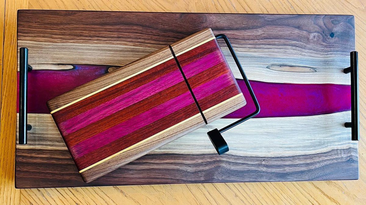 Another River charcuterie board and cheese cutter out the door. Made with a special two-tone epoxy pigment, called “liquid fire”, it changes color depending on where you stand!

#607woodshop #custom #handmade #charcuterie #charcuterieboard #MadeInAmerica