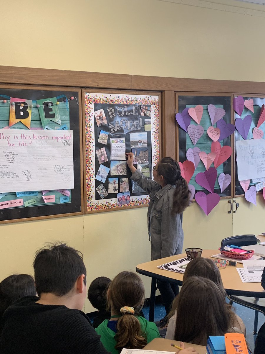 Our Previous Role Model sharing her All About Me board to her classmates