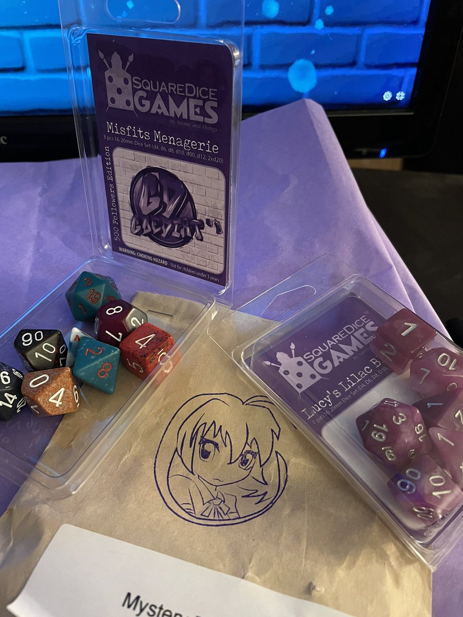 wolfhoundmama's tweet photo. OMG
Goodies from the giveaway @Goedirt hosted on Misfits Managerie arrived today! The books are perfect for this DM I’m training, and @animewoodstock’s dice?!?! PURRRPLE 🤤🤤 ::squeeee::
#DnD #dungeonsanddragons #squaredicegames #DMintraining #ttrpg https://t.co/6X5Sne3YLY