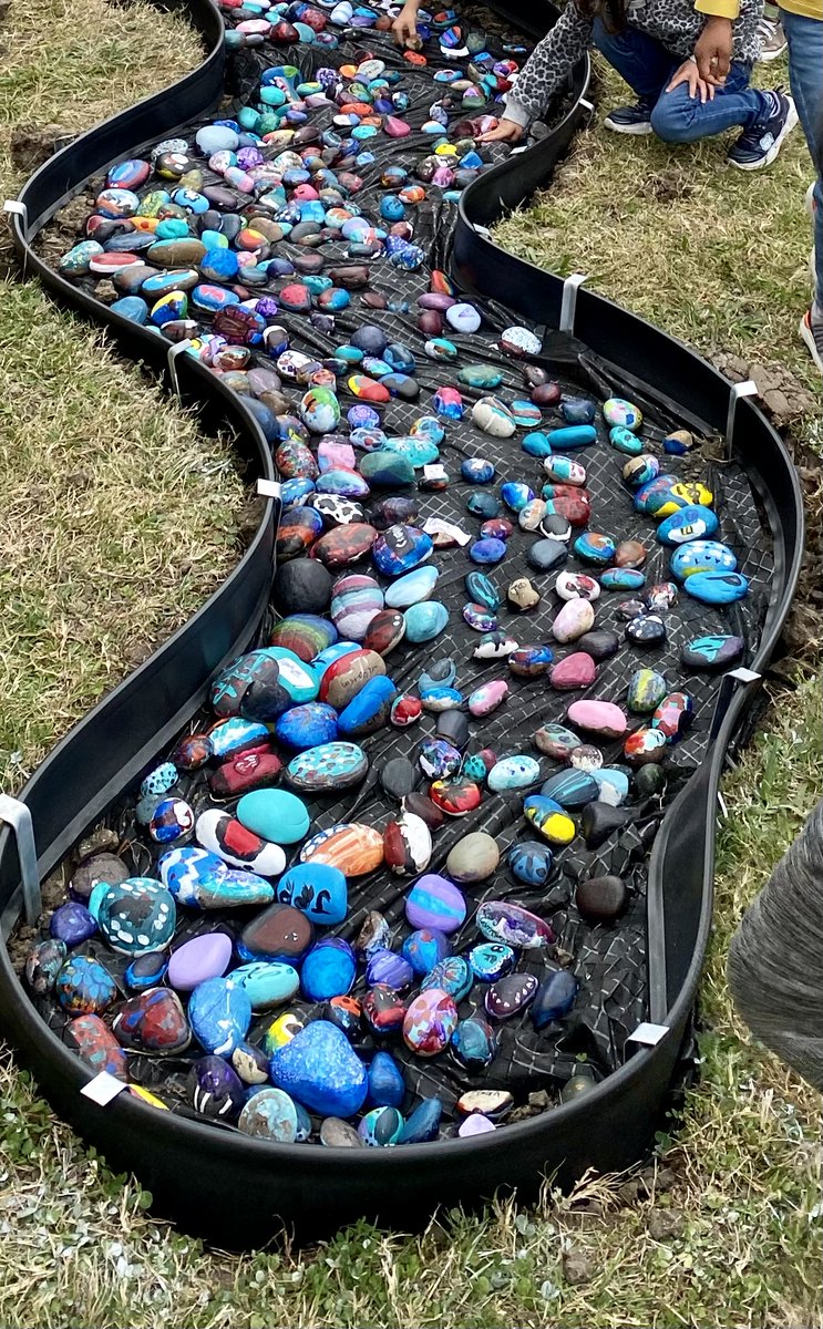 Meridiana artists put their painted river rocks in the "river bed" today to make their mark #bigartday22