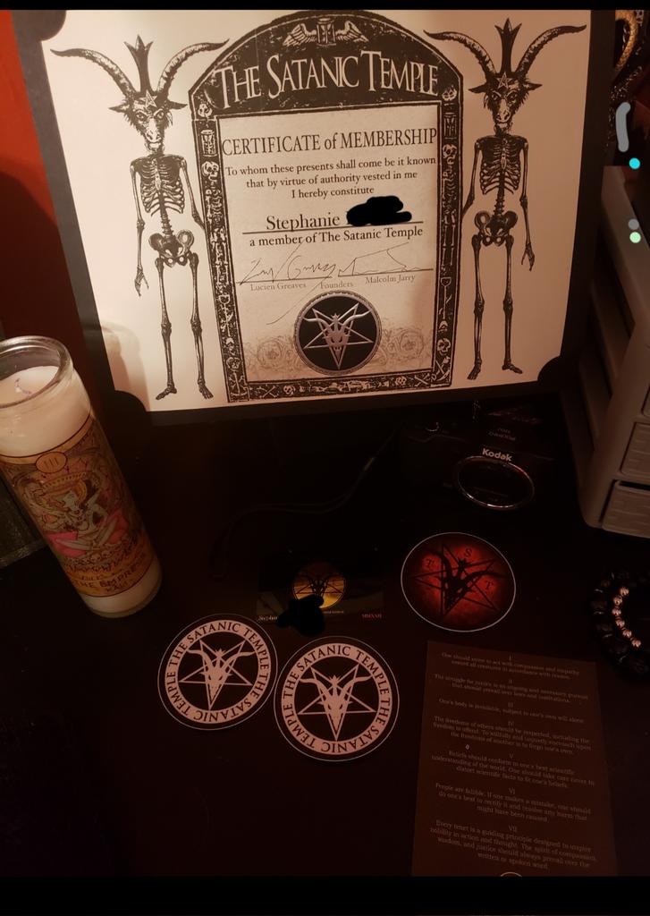 sweetsassy25's tweet photo. I love my new display on my dresser. Thank you @satanic_temple_ for this wonderful certificate. I waited two years to buy it and I am glad to own it. #SATANIC #TheSatanicTemple #LucienGreaves #makingitoffical https://t.co/Uz1Ark4OVe