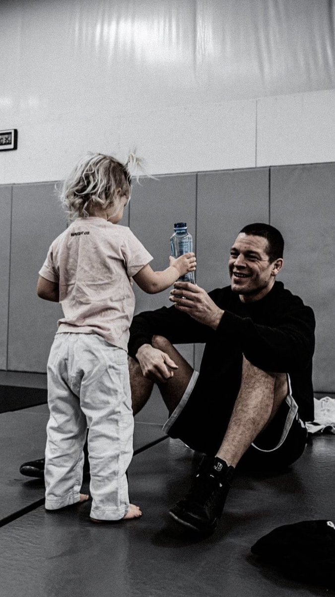 GeezFX's tweet photo. nate diaz and his daughter is wholesome 🖤 https://t.co/0yI7qZt78i