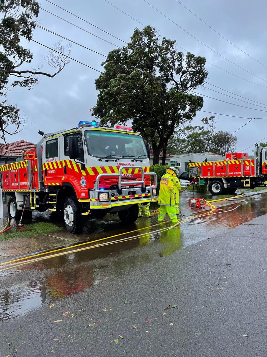 NSWRFS's tweet photo. Thanks to our volunteers working in terrible conditions this afternoon, alongside the @NSWSES and other emergency services, with widespread flooding. It seems the locals were thankful as well. 📷 Engadine #NSWRFS brigade. https://t.co/naErDiqKMS