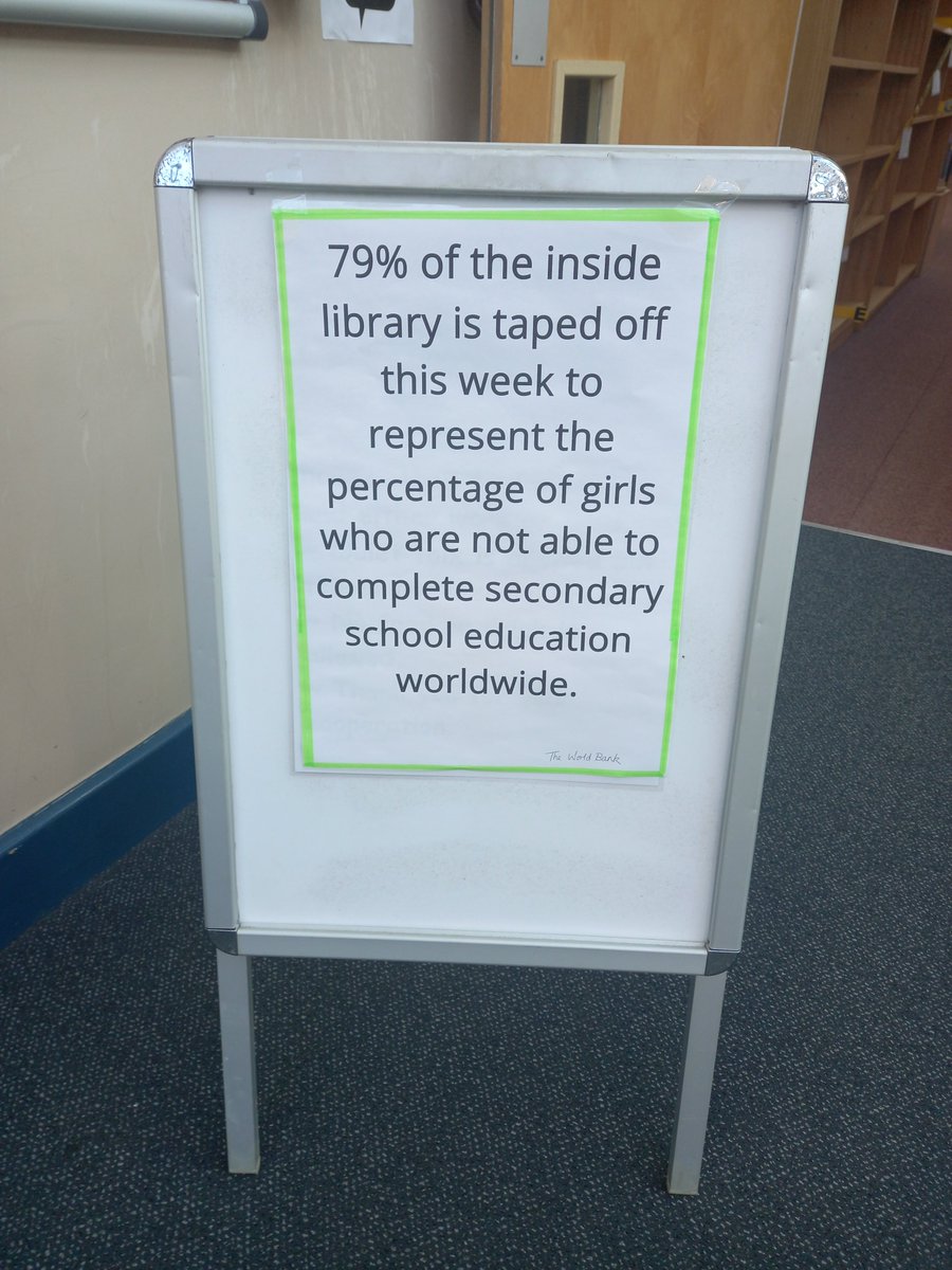CryptLibrary's tweet photo. The #CryptLibrary is marking #InternationalWomensDay by symbolically restricting access to 79% percent of the books in the main area. Quotations attached to the tape are from UNICEF, The World Bank, WHO, and Plan International. #IWD2022 https://t.co/cBRd7TPe7N