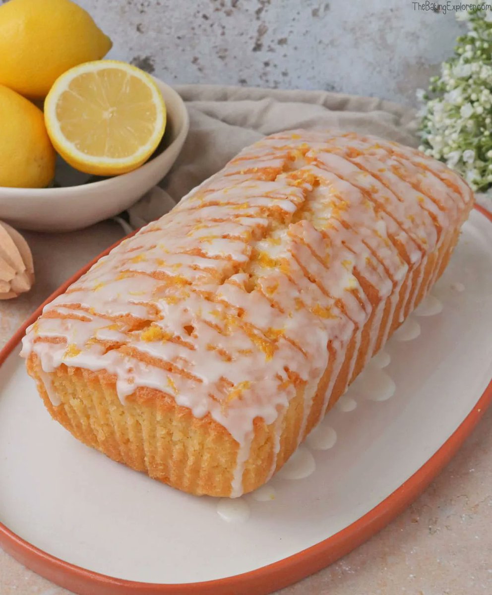 BakingExplorer's tweet photo. This Lemon Drizzle Loaf Cake is a baking classic! It's light, fluffy and full of lemon zing! Get the recipe here: https://t.co/4pWXAhgKTQ https://t.co/y1kGnaLwKB