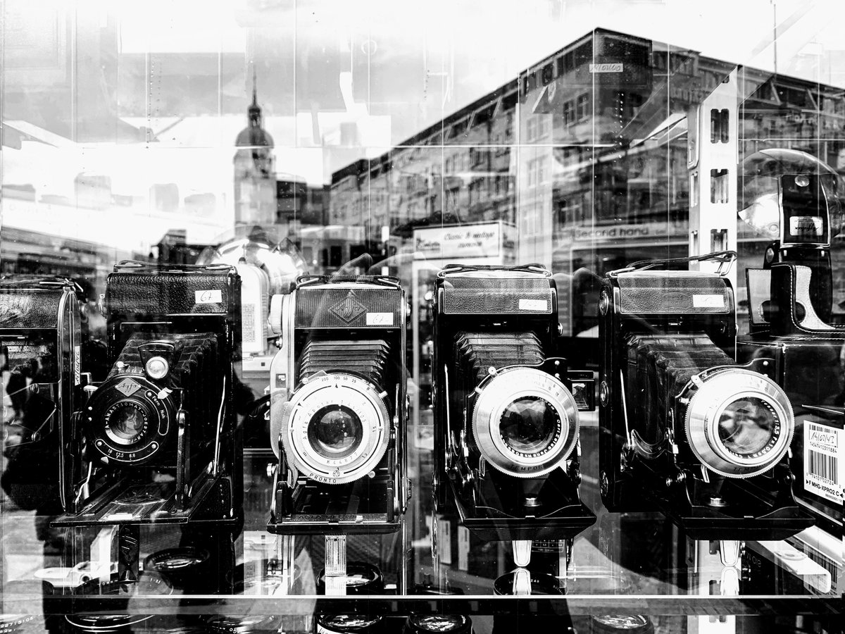MervRPhotos's tweet photo. The Watchers •  In Cologne, Germany old cameras with the town reflection in the window • Imagine what these cameras have seen and the stories they could tell.

#nftphotography #cityscape #streetphotography #Germany #blackandwhitephotography #urbanphotography https://t.co/DNmWPaLN5p