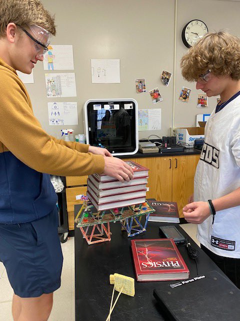WCDS_Science's tweet photo. After 2 weeks of learning about bridges, students in Mrs.Marsh’s class tested the strength of bridges they built. The winning bridge held 59.5 pounds of weight and only weighed 0.17 pounds. Wow! #WCDSScience #WCDSUpperSchool #WCDSAcademicExcellence https://t.co/rOKAFslbfK