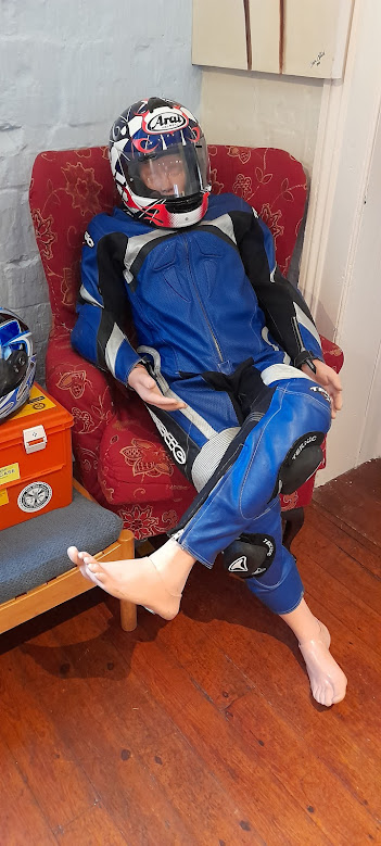 LeggeHouse's tweet photo. Isle of Mann T.T. Marshals trained at Legge House ready for their first race in three years.  This guy was bored, and got himself trapped in a sidecar. https://t.co/IxYtsL239y