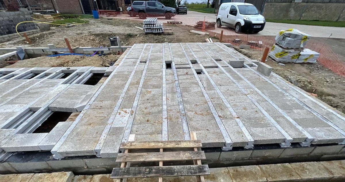 OmurcaLtd's tweet photo. Brick work progressing, beam and block started and retaining wall is taking shape at one of our projects. Oak frame, exposed beams and stone facade new build. The project has a tennis court and detailed external landscaping. #oakframe #newbuild #newbuildhomes #construction https://t.co/jaNmwYSXSe
