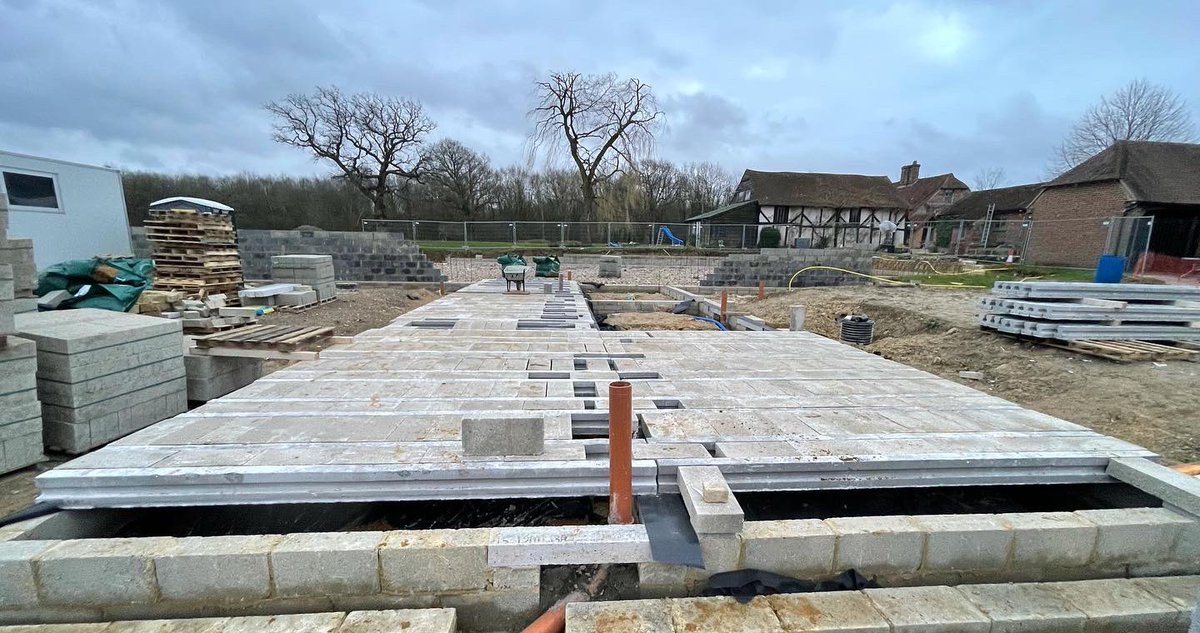OmurcaLtd's tweet photo. Brick work progressing, beam and block started and retaining wall is taking shape at one of our projects. Oak frame, exposed beams and stone facade new build. The project has a tennis court and detailed external landscaping. #oakframe #newbuild #newbuildhomes #construction https://t.co/jaNmwYSXSe