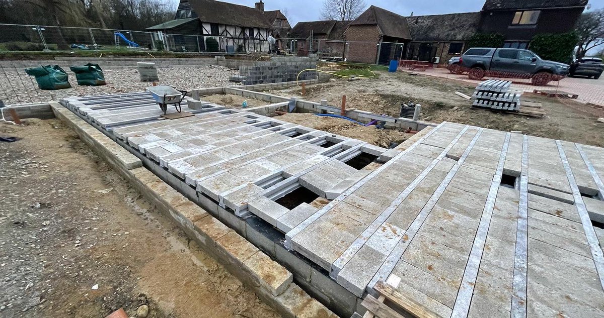 OmurcaLtd's tweet photo. Brick work progressing, beam and block started and retaining wall is taking shape at one of our projects. Oak frame, exposed beams and stone facade new build. The project has a tennis court and detailed external landscaping. #oakframe #newbuild #newbuildhomes #construction https://t.co/jaNmwYSXSe