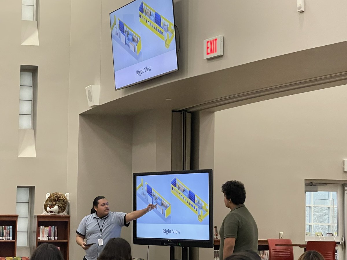 TechieDanielle's tweet photo. Watching students at @BlansonCTEHS present their mobile library bus project. This is going to be awesome! https://t.co/mvpCvpvkig