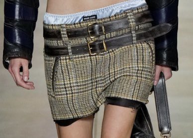 TheBlackGlinda's tweet photo. Miuccia Prada giving us more mini skirts at Miu Miu f/w ‘22 https://t.co/Cx1eKHkb79