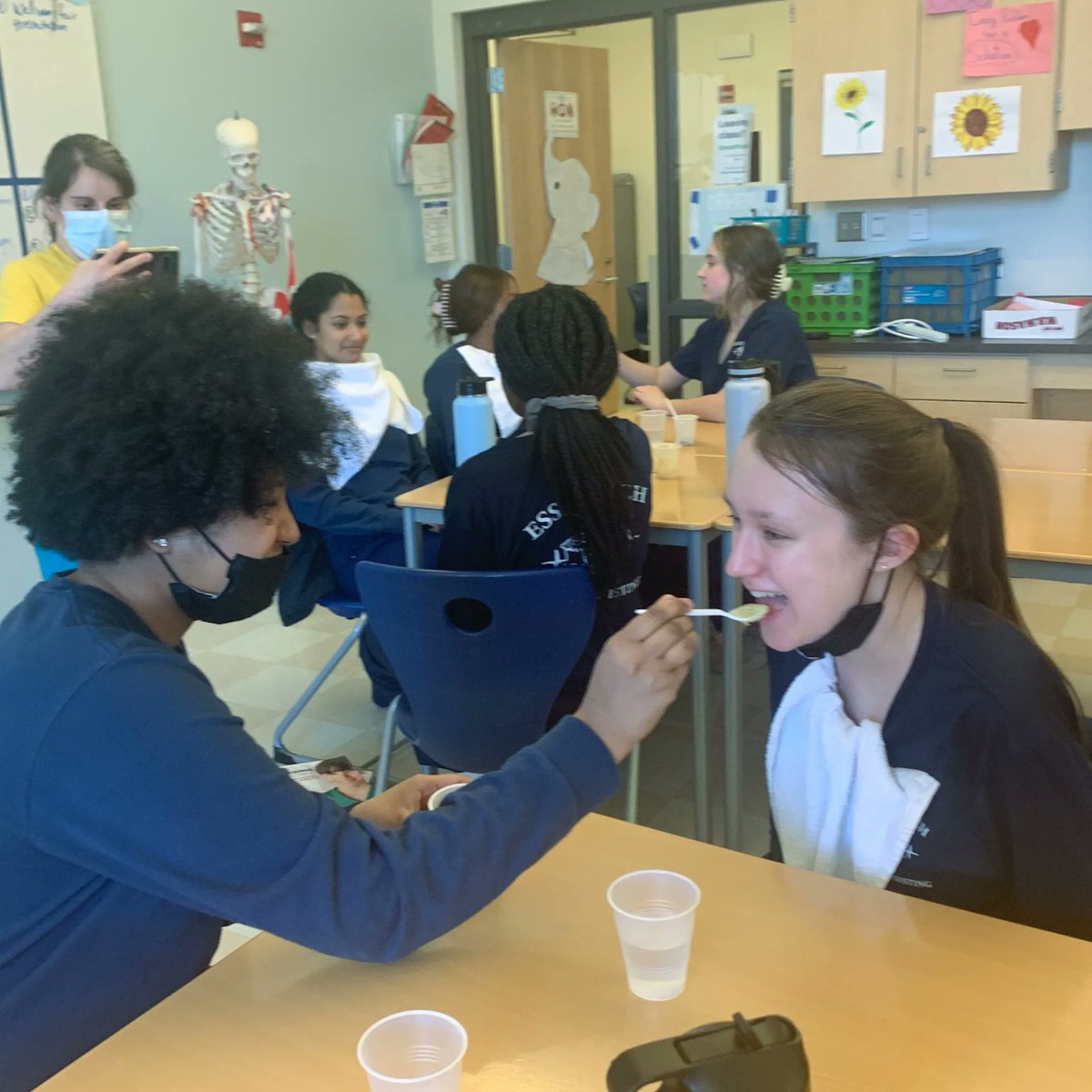 EssexNorthShore's tweet photo. Grade 10 Health Assisting students preparing to start clinical by learning about therapeutic diets and how to feed residents puréed food. 
#HawkTalk #CreateEncouragePromoteDevelop #ENSATS #TechnicalSchool #TechnicalEducation #CTE #AgEdu #HealthAssisting #Health https://t.co/3azOSkkiF5