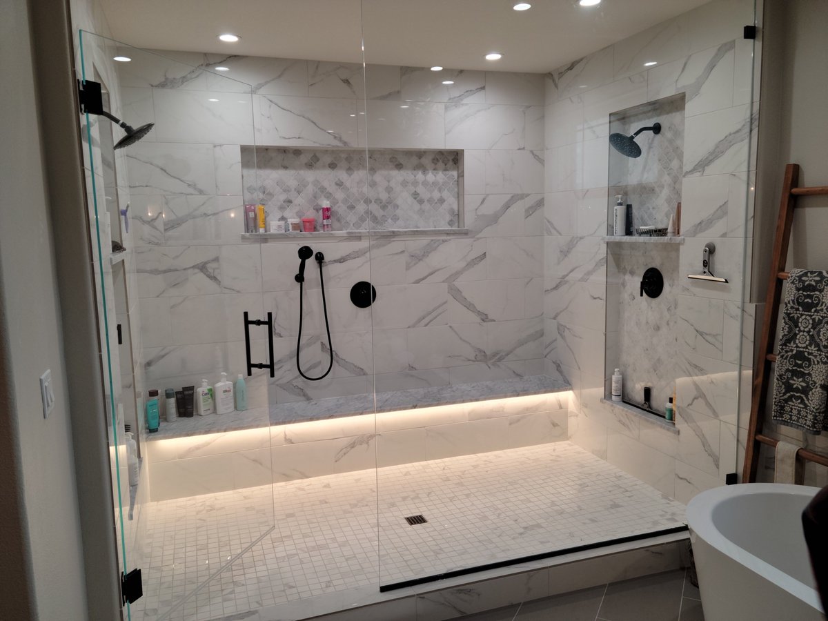 Recently completed- this gorgeous bathroom remodel by Leitner Construction. Look at the size of that shower! Congratulations to the entire team involved in this project. #homedecor #interiordesign #bathroom