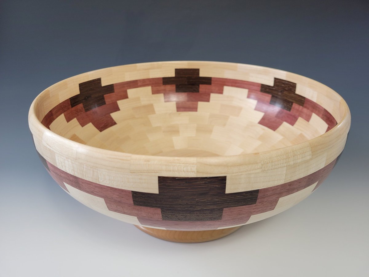KyleStubbins's tweet photo. Finally got this bowl sanded, finished and parted from the lathe.

217 pieces of maple, wenge &amp; purpleheart. 12.5"W x 5.625"H

#woodworking #segmentedturning #creationsbyKAS #ontariomakers https://t.co/htWaWp1RPg