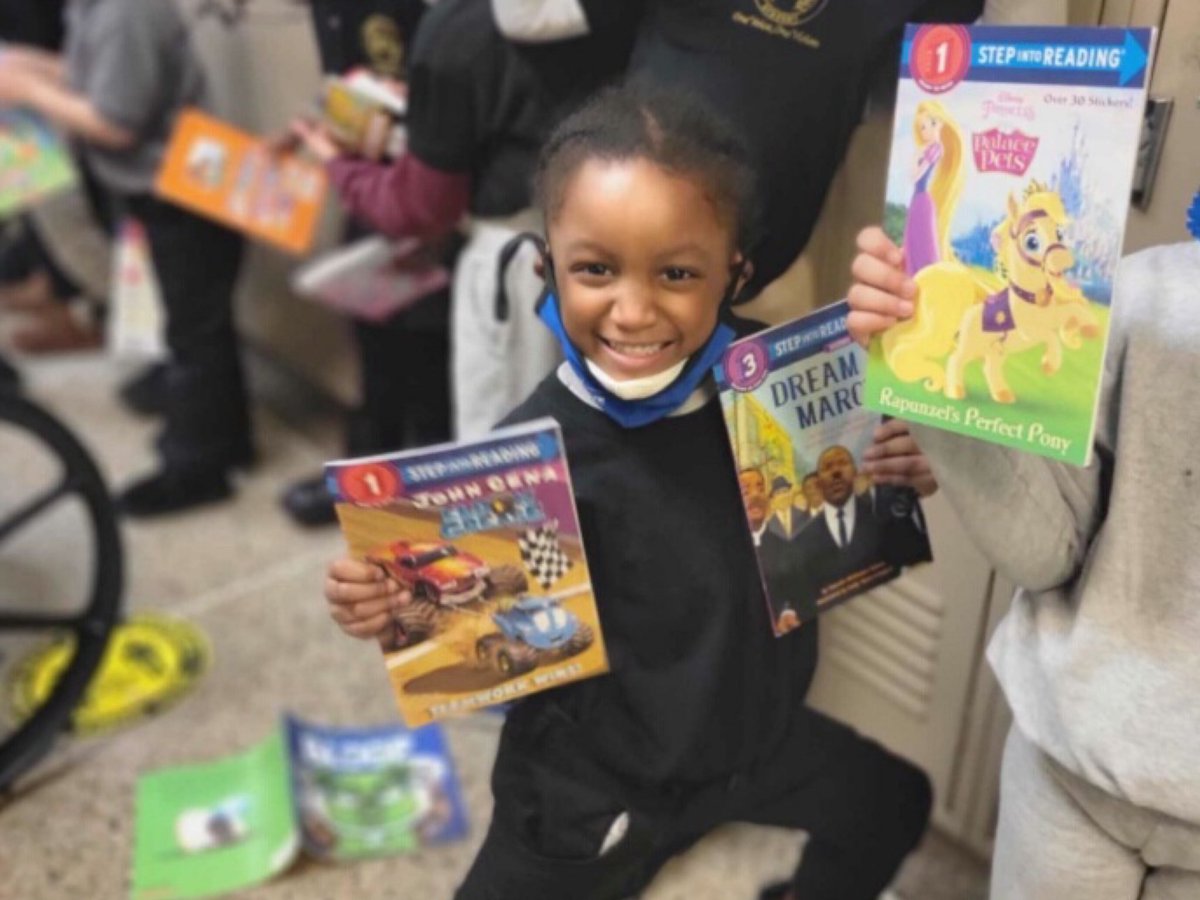 HallFinancial's tweet photo. We were at George Crockett Academy in #Detroit today to gift books to #students and we could not be more thrilled to give back to our #community in such a special way. Our partner @CadeCunningham_ stopped by to help kids pick out books, read a little, and share some laughs! https://t.co/CAzUZJY0Zs