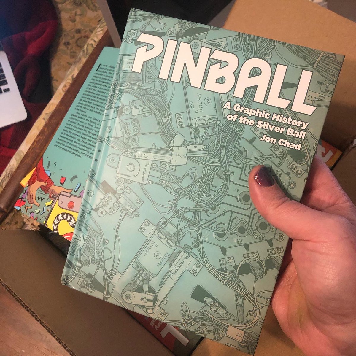 jon_chad's tweet image. Eeee!!!! It’s real!  I just got my first look at an IRL copy of my new graphic novel about PINBALL and I am over the moon with how it turned out! The team at @01firstsecond did such an amazing job!  You’ll be able to see it in person TOO, on Tuesday, April 5th!!