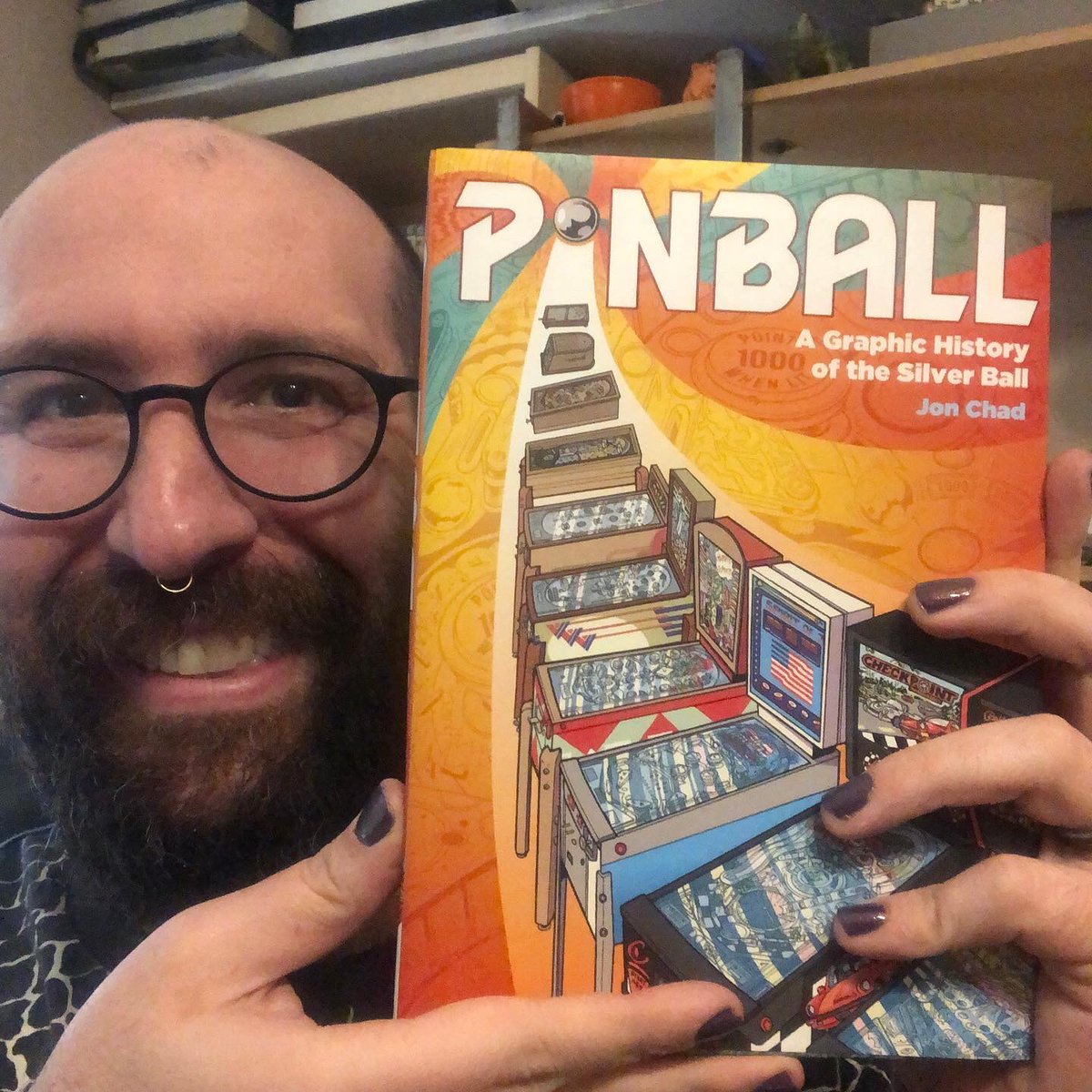 jon_chad's tweet image. Eeee!!!! It’s real!  I just got my first look at an IRL copy of my new graphic novel about PINBALL and I am over the moon with how it turned out! The team at @01firstsecond did such an amazing job!  You’ll be able to see it in person TOO, on Tuesday, April 5th!!