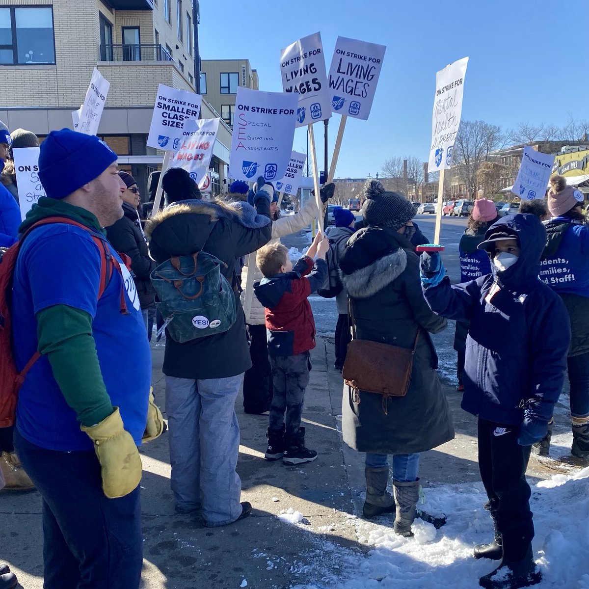 erinmbarwis's tweet photo. When your kid insists on picketing with their teachers, you go. Support mental health for our kids. Support livable wages for our educators. #mplslove #mft59 #thetimeisnow https://t.co/pNgTaVnuvf