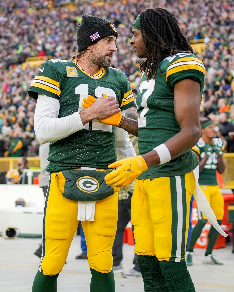 NFL's tweet photo. Back with the Pack. 🤝

@AaronRodgers12 | @tae15adams https://t.co/Hu3JQxWfHC