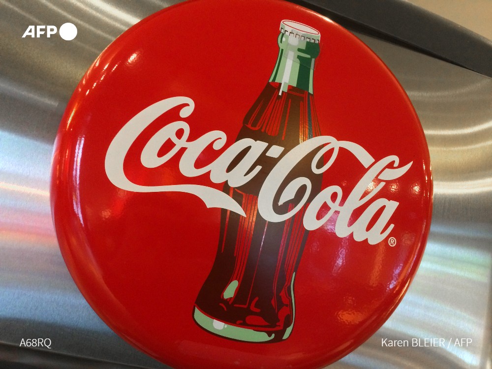 AFP's tweet photo. #BREAKING Coca-Cola says it will suspend Russia operations https://t.co/diEjhKUQsd
