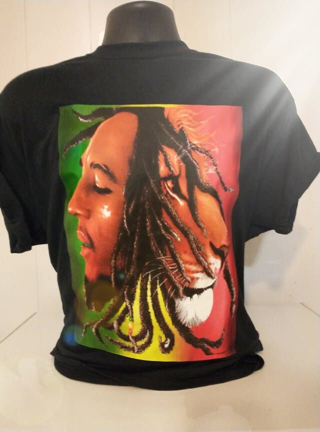 atoyahill's tweet photo. Thanks for the kind words! ★★★★★ "Great graphics, generous size, quality material. Very pleased." Lynne B. https://t.co/alOQjqB387 #etsy #bobmarley #marleytshirt #marley #blacktshirt #blackshirt #reggae #cgirlcreationz https://t.co/vVtnvKYTOV