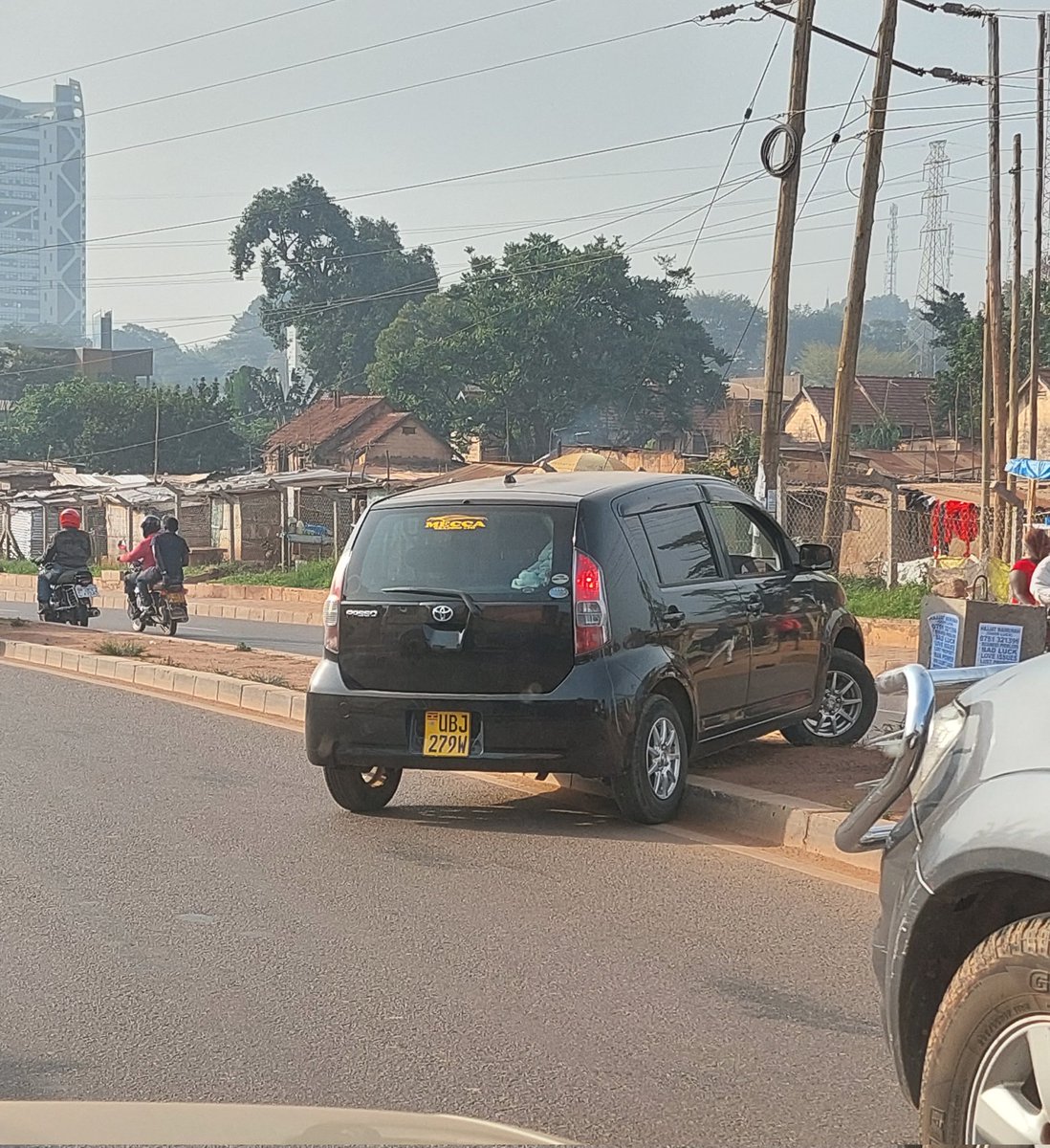 This lady decided to drive over a pavement on Stretcher. Why do we do this? <a href="/AKasingye/">AIGP(Rtd) Asan Kasingye</a>