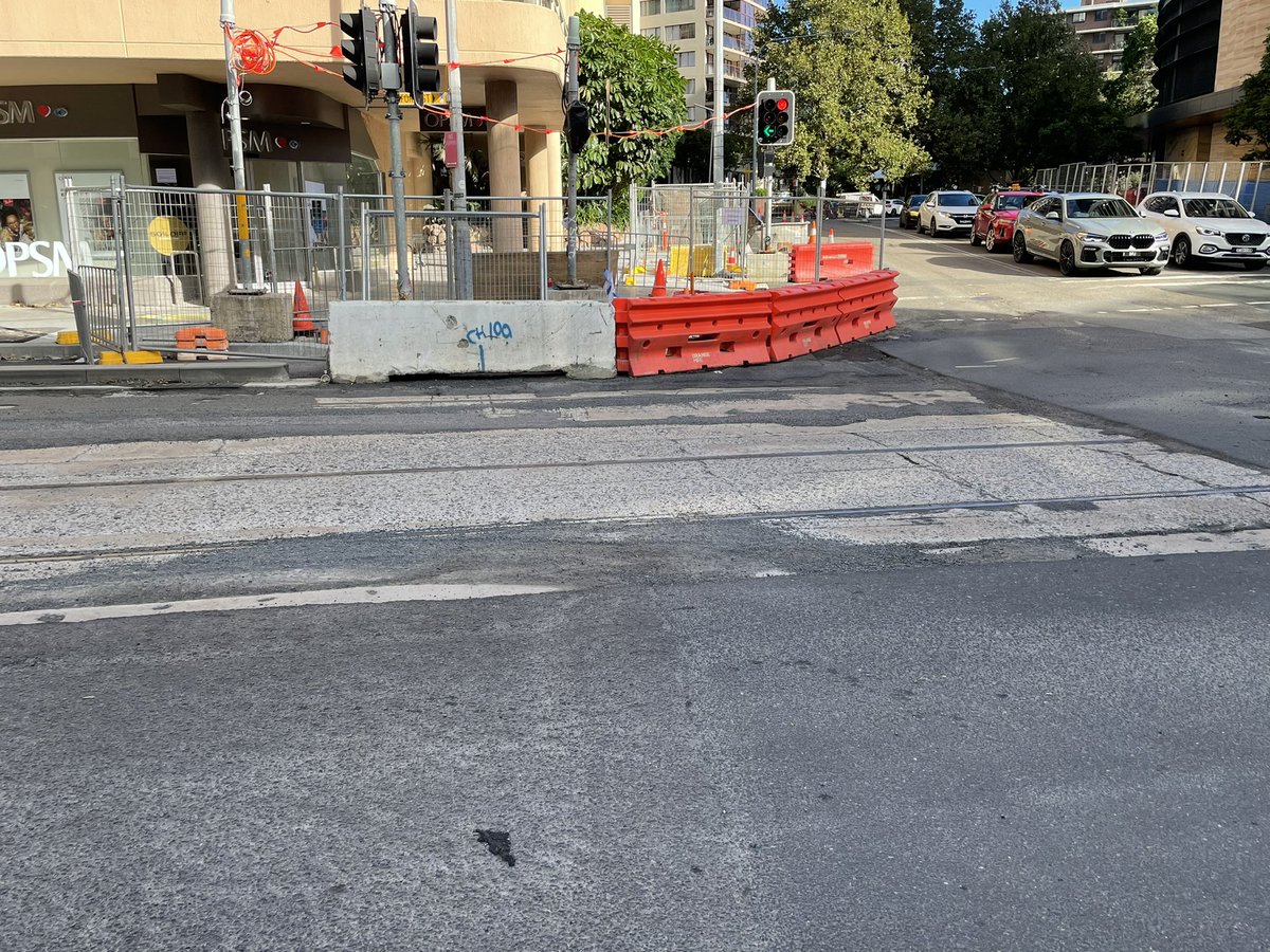 bambul's tweet photo. Road works in Bondi Junction have revealed what looks like the old tram tracks on Oxford St. It’s been hard to take a close look with all the weather, but I’m pretty sure that’s what they are. A rare sight. https://t.co/PIkS2a1US3