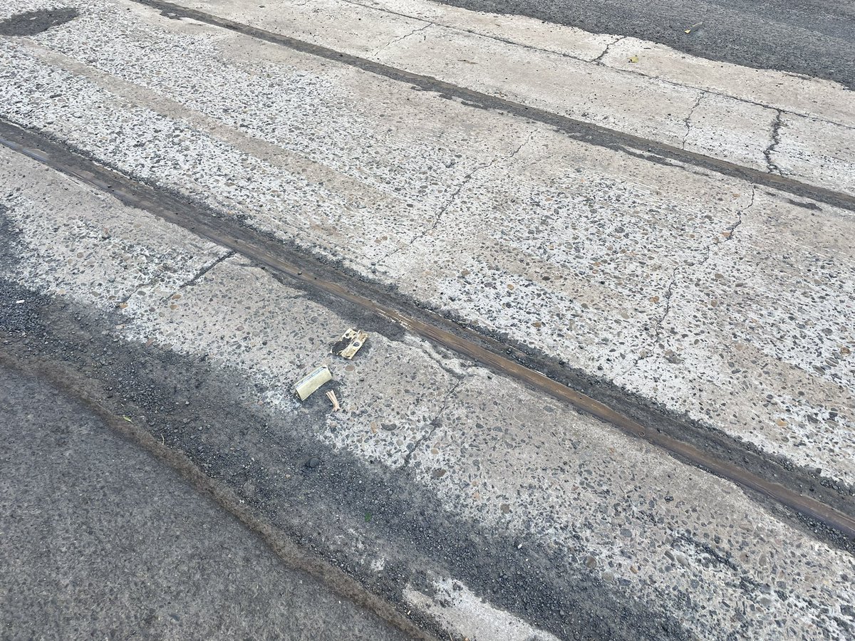 bambul's tweet photo. Road works in Bondi Junction have revealed what looks like the old tram tracks on Oxford St. It’s been hard to take a close look with all the weather, but I’m pretty sure that’s what they are. A rare sight. https://t.co/PIkS2a1US3
