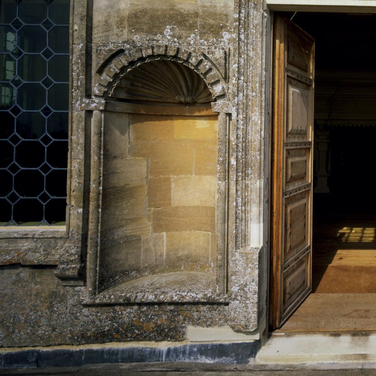 The two niches either side of the doorway onto the balcony stand empty. Niches like this would typically house statues or objects like urns, but we don't know what might have been here. What do you think?