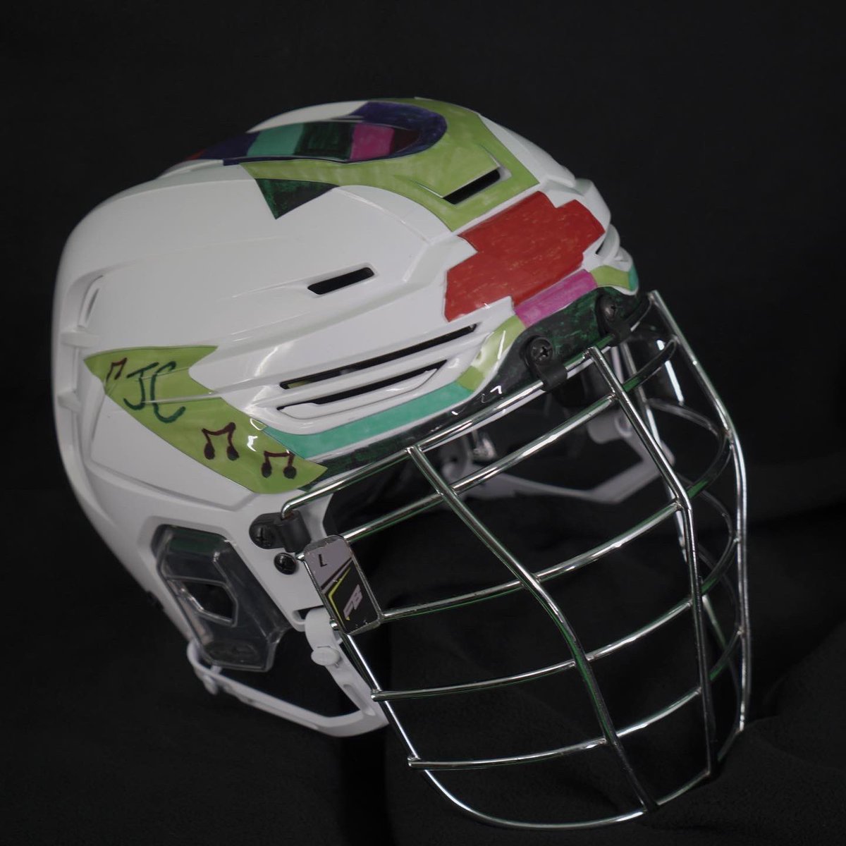 SealsLax's tweet photo. Our players will wear helmets this weekend with special decals designed by children with Down syndrome part of Down Syndrome Awareness Night 💜

All helmets &amp; some special pieces are now available for auction via the @DASHauction app. Download the app today to place your bids! https://t.co/HysP0PvCO0