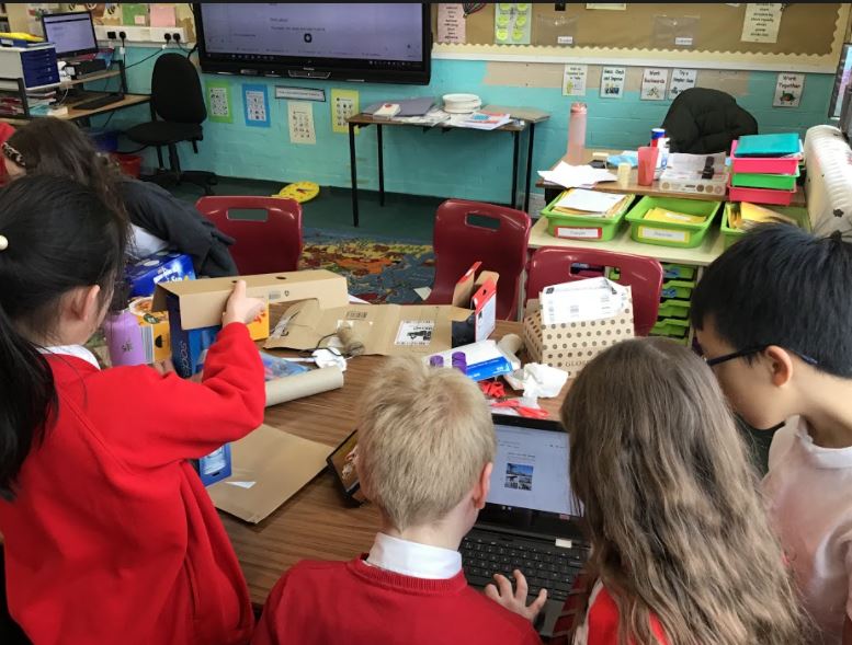 Carolside_PS's tweet photo. P5c at the planning & building stage of our engineering challenge - to build a crane that can lift an egg 30 cm off the ground and return it in one piece. #CPSSTEAM #ERSTEM #BSW22 https://t.co/fL4UgGkRFD